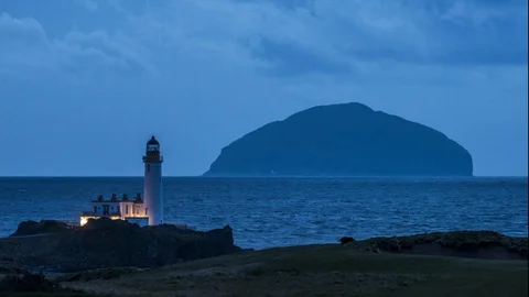 Turnberry lighthouse &amp; the Ailsa Craig Stock Footage 124846067