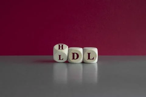Turned a cube and changes the expression LDL  to HDL Stock Photos