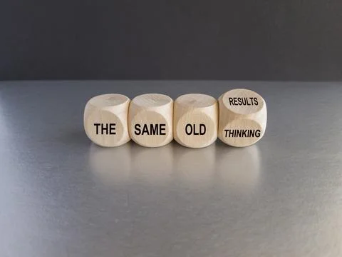 Turned cube and changes expression the same old thinking to the same old results Stock-Fotos