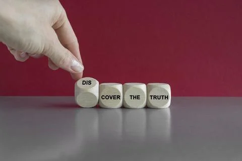 Turned a cube and changes expression cover the truth to discover the truth Stock Photos