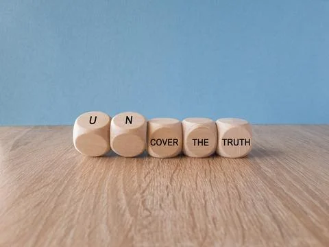 Turned a cube and changes  expression cover the truth to uncover the truth Stock Photos