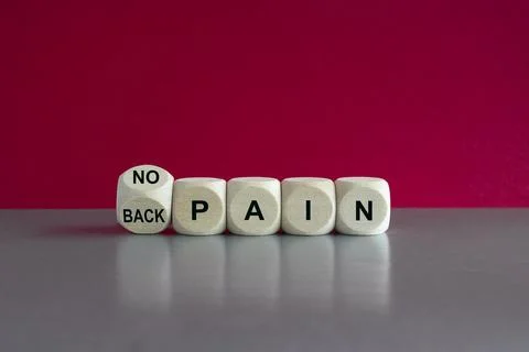 Turned a cube and changes the expression 'back pain' to 'no pain'. Foto stock