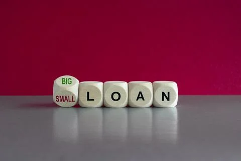 Turned a cube and changes red word service Small loan to Big loan Stock Photos