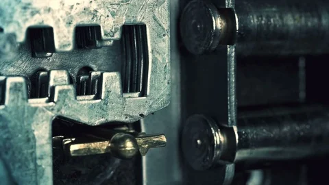 Turned key inside the lock close-up Video stock 74401186