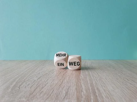 Turned a wooden cube and changes the German word Einweg  to Mehrweg Stock Photos