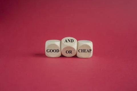 Turned wooden cube and changes the expression good or cheap to good and cheap Stock Photos