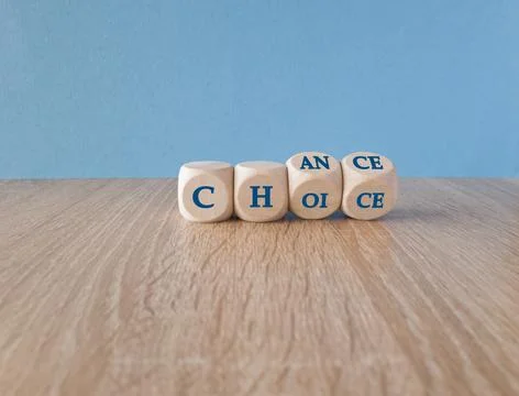 Turned wooden cubes and changes the concept word Choice to Chance. Stock Photos
