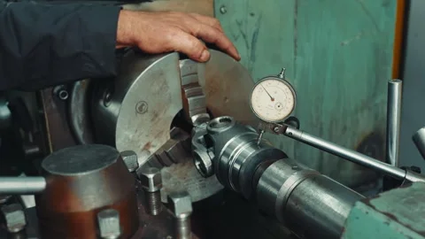 The turner prepares workpiece in lathe before work Video stock 284545034