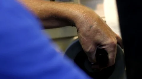 Turner processes the part at the factory Stockbeeldmateriaal 75545730