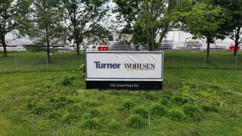 Turner Wohlsen Construction sign marks site entrance on Greenfield Road in Stock Footage 337978501