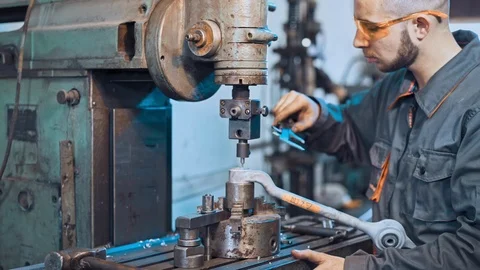 Turner is working on the machine Stock Footage 116628264