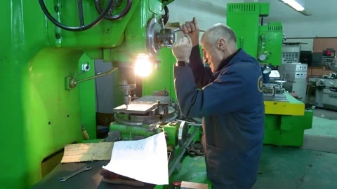 Turners and millers work at the machines. The milling shop at the factory. Stock Footage 269672853