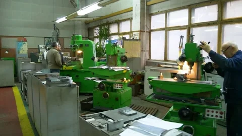 Turners and millers work at the machines. The milling shop at the factory. Stock Footage 269672946