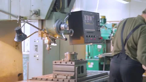 Turners and millers work at the machines. The milling shop at the factory. Stock Footage 269674514