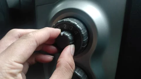 Turning AC knob in a car Stock Footage 256988299