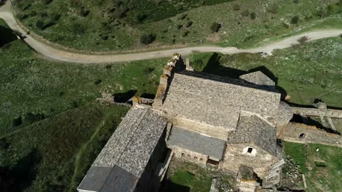 Turning aerial view of a medieval monastery. Sant Quirze de Colera. Stock Footage 145989402
