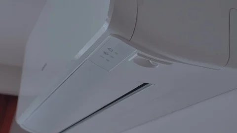 Turning Air Conditioner. Close Up Turning On and Off Air Conditioner Stock Footage 112881097