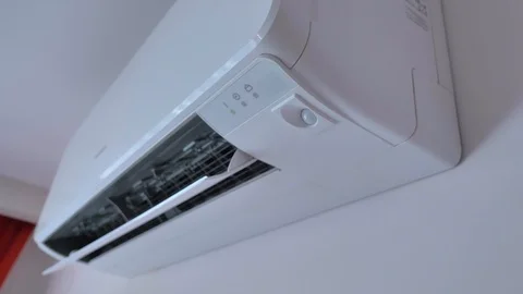 Turning Air Conditioner. Close Up Turning On and Off Air Conditioner Stock Footage 112881359