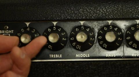 Turning amp knob to zero on vintage guitar amplifier Stock Footage 35829299