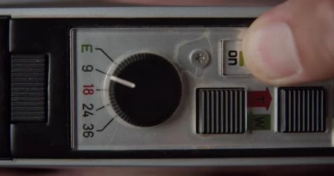 Turning on and off Bauer Super 8 camera device, close up view Stock Footage 169441682