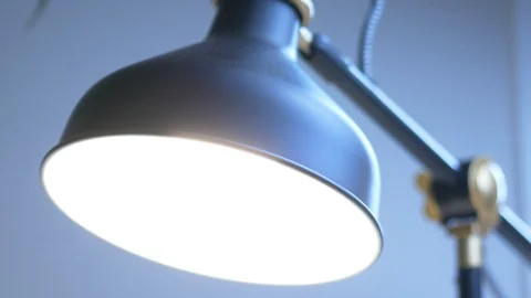 Turning ON and OFF a Desk Lamp Closeup Stock Footage