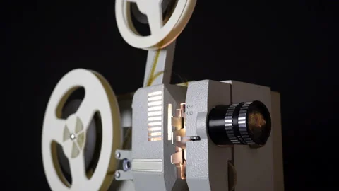 White Film Reels Rotating Oldfashioned 8Mm Movie Projector Playing Bobbin  Tape, Stock Footage