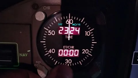 Turning on and operating airplane clocks at night Video stock 294571925