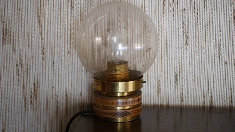 Turning on and off retro old lamp Stock Footage 88828537