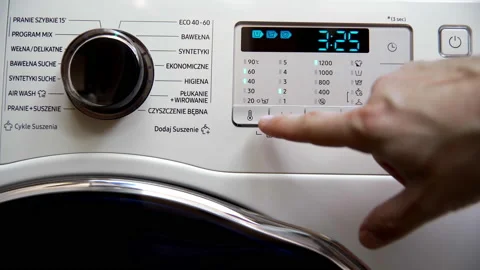 Turning on and setting the laundry program and automatic washing machine only. Stock Footage 231552590