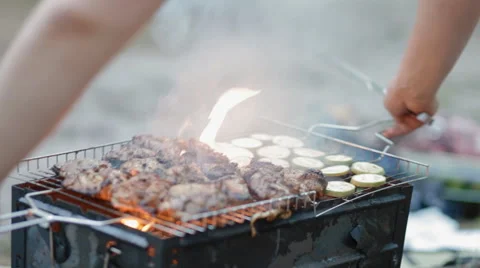 Turning around the cell   on bbq Stock Footage 52316071