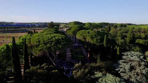 Turning around villa that is hidden in the trees in Montpellier, France. Stock Footage 201247434