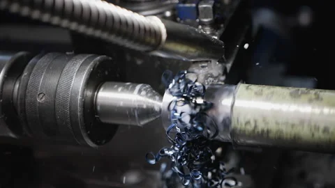 Turning bench lathe machine working - with cooling fluid dripping Stock-Footage 151404831