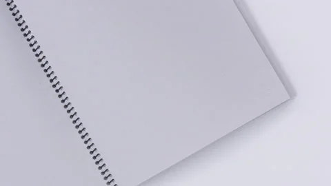 Turning binder book page in wind Stock Footage 162641761