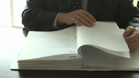 Turning binder pages 스톡 동영상 77051674