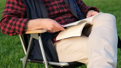 Turning book page Stock Footage 168651563