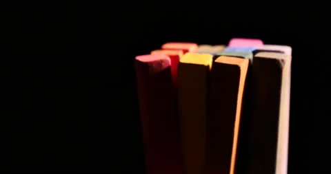 Turning a bunch of chalk pastels Stockbeeldmateriaal 162612792