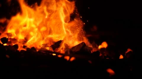 Turning Burning Coals in a Blacksmith Forge Stock Footage 51640342