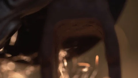 Turning the butt of the flood grinder. Close-up Stock Footage 128627830