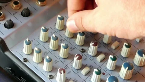 Turning buttons on a mixer Stock Footage 168924083