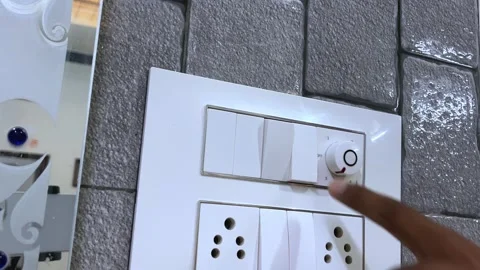 Turning Off Ceiling Fan Using Wall Switch Stock Footage 315206285