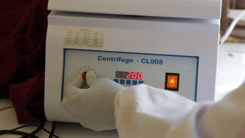 Turning on a centrifuge Stock Footage 126302954