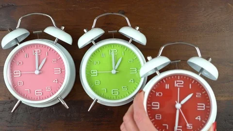 Turning the clocks back one hour for Autumn Fall daylight saving time. Stock Footage 79142023