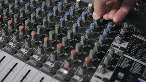 Turning Colorful EQ Knobs on a Soundboard 스톡 동영상 318576521