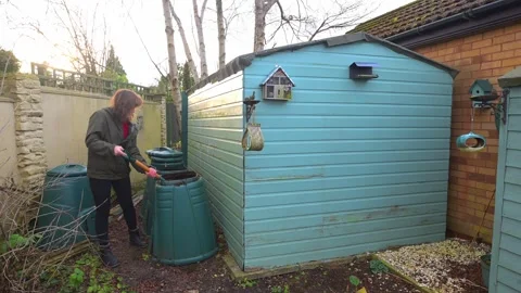 Turning the compost in slow motion Stock Footage 321471377
