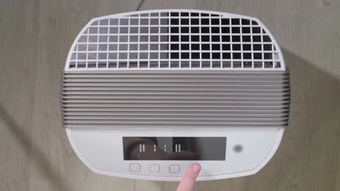 Turning on the device to protect against viruses, bacteria and allergies. Stock Footage 217424930