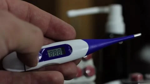 Turning on the digital thermometer Stock Footage 258796182