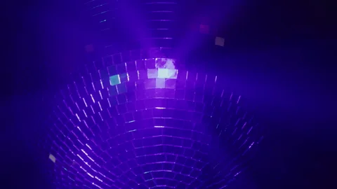 Turning Disco Ball Reflects Different Colors Stock Footage 270402827