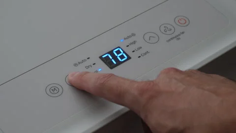 Turning Down Temperature on Thermostat in Summer in Hot Weather. Setting Di.. Stock Footage 312120739