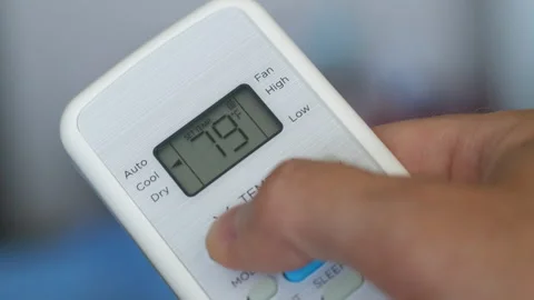 Turning Down Temperature on Thermostat in Summer in Hot Weather. Setting Di.. Stock Footage 312121232