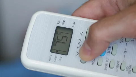 Turning Down Temperature on Thermostat in Summer in Hot Weather. Setting Di.. Stock Footage 312121275